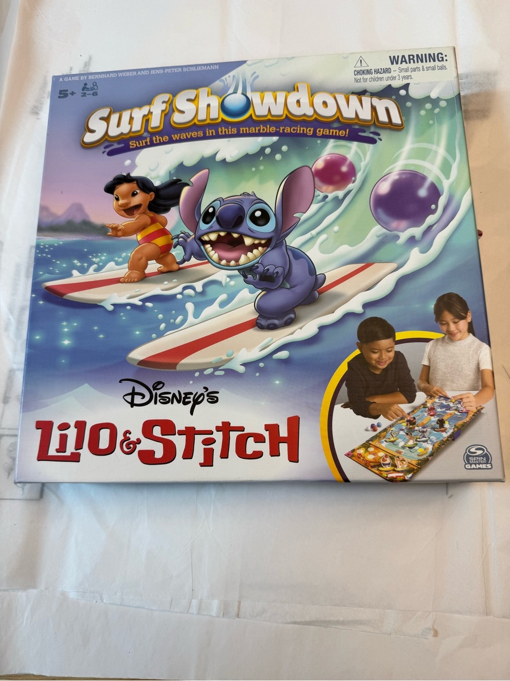 Disney Lilo & Stitch Surf Showdown Game - like new; small tear on side of box